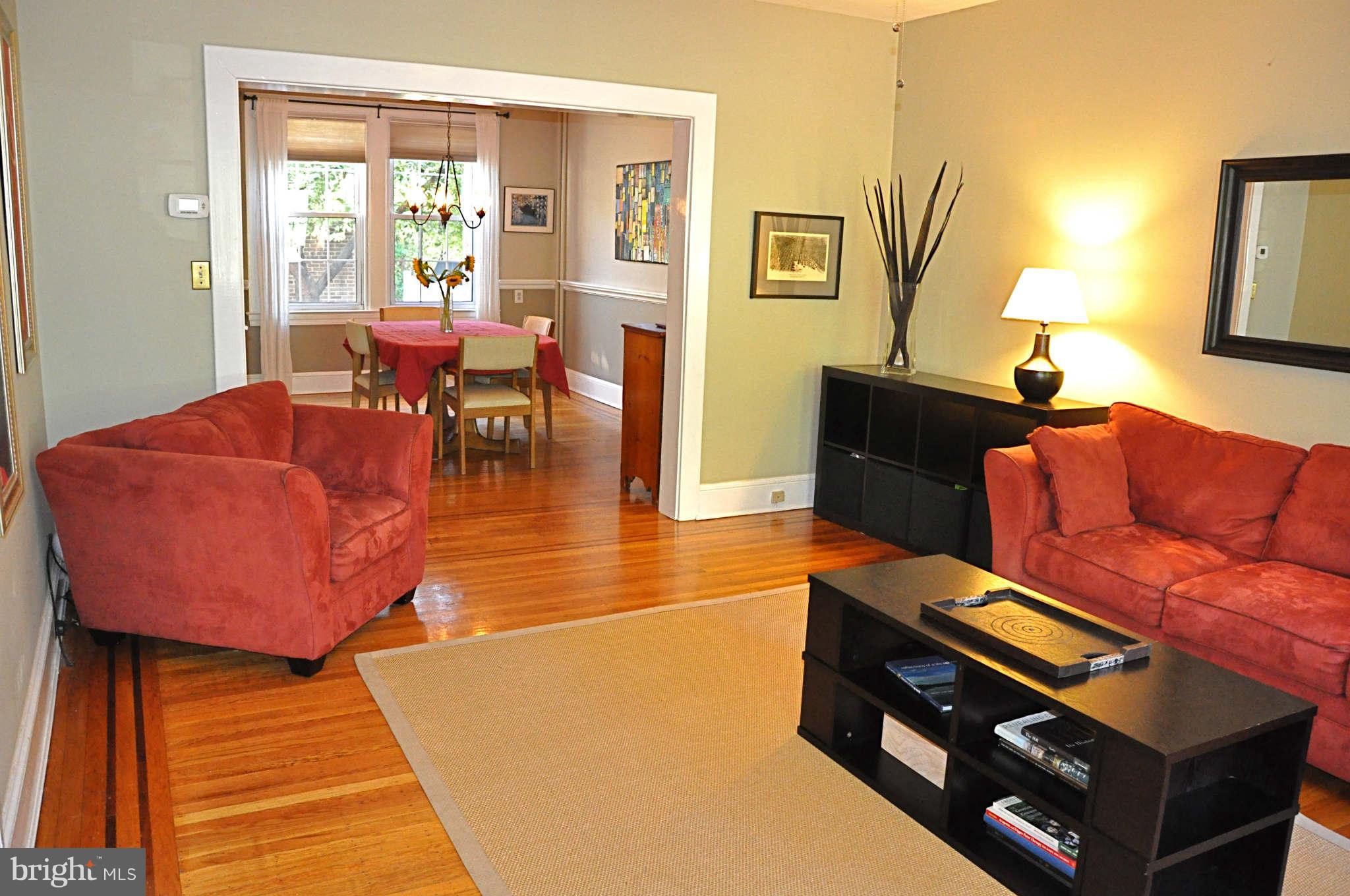 3825 Keswick Road Baltimore, MD 21211 - Photo 3 of 30 a living room with furniture and a window