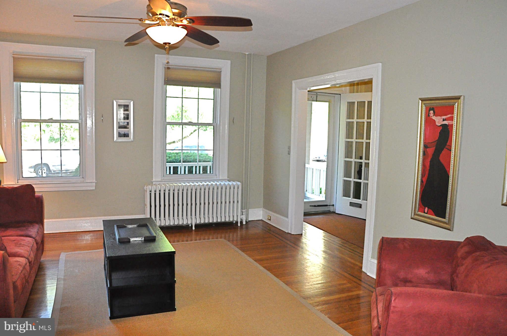 3825 Keswick Road Baltimore, MD 21211 - Photo 4 of 30 a living room with furniture and a window