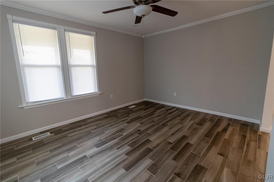 6366 Farm Bureau Road Allentown, PA 18106 - Photo 13 of 36 a view of a room with wooden floor and windows