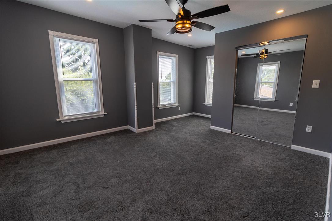 6366 Farm Bureau Road Allentown, PA 18106 - Photo 20 of 36 an empty room with windows and fan