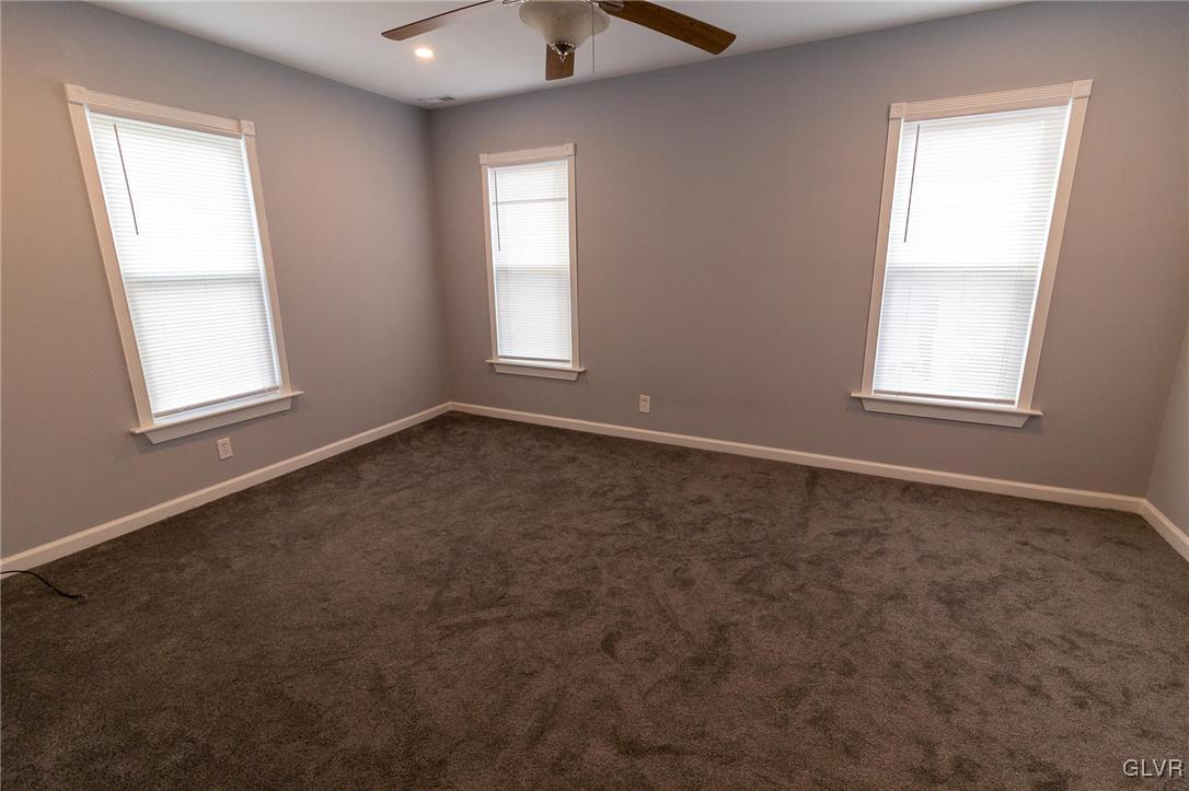 6366 Farm Bureau Road Allentown, PA 18106 - Photo 23 of 36 an empty room with windows