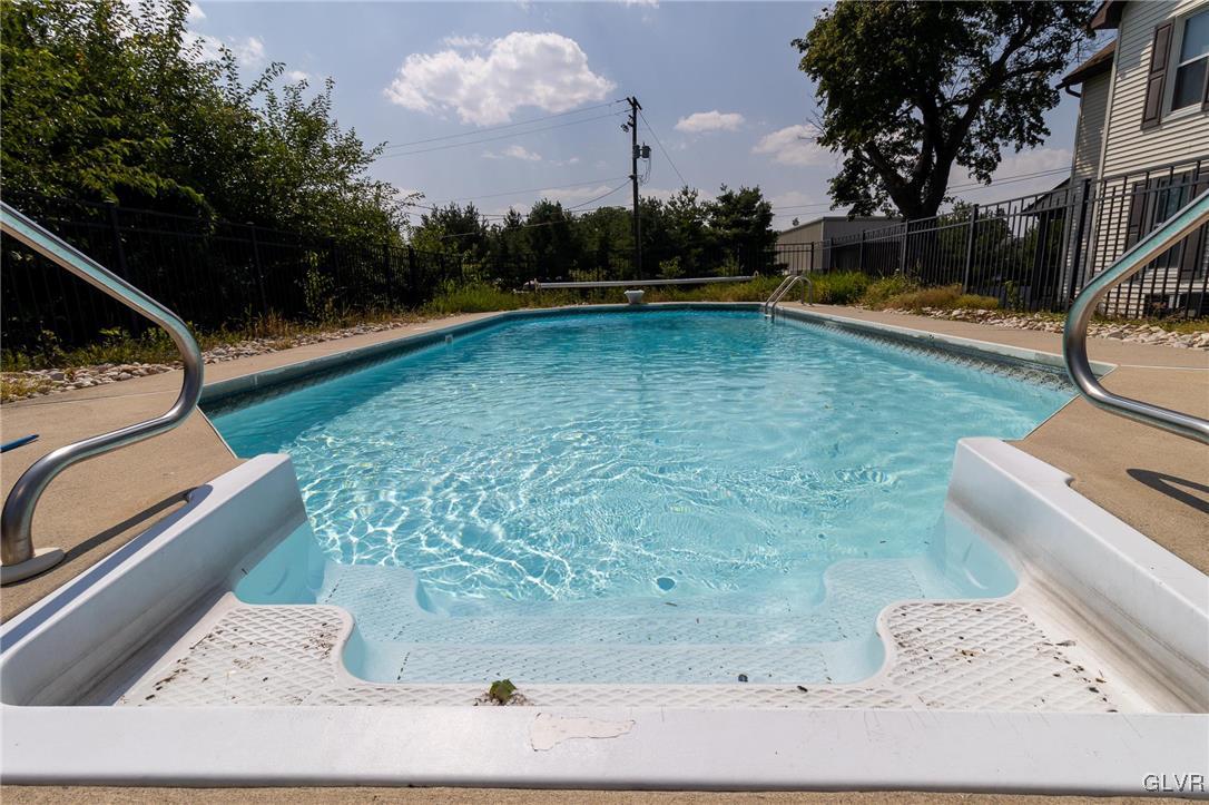 6366 Farm Bureau Road Allentown, PA 18106 - Photo 25 of 36 a view of a swimming pool with a patio