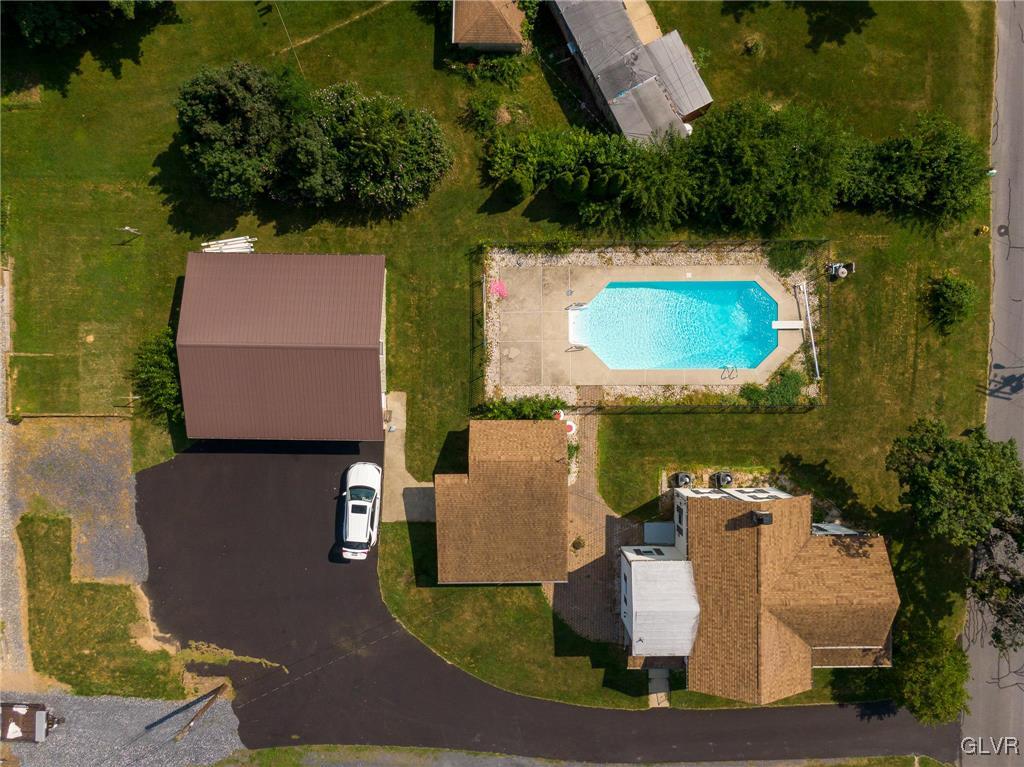 6366 Farm Bureau Road Allentown, PA 18106 - Photo 3 of 36 an aerial view of a house with a garden and lake view