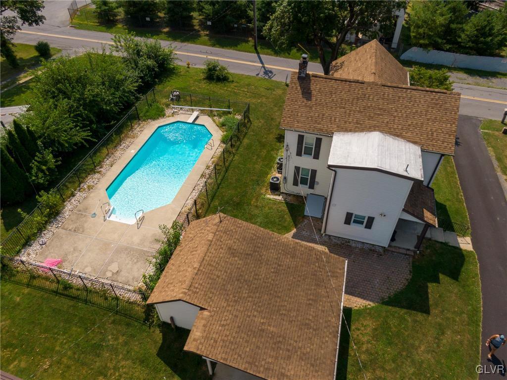 6366 Farm Bureau Road Allentown, PA 18106 - Photo 34 of 36 an aerial view of a house with a yard and lake view