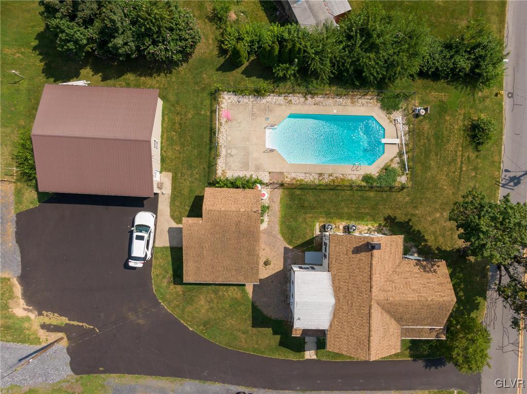 6366 Farm Bureau Road Allentown, PA 18106 - Photo 4 of 36 an aerial view of a house with outdoor space and pool