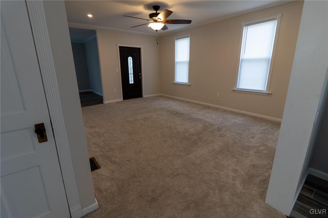6366 Farm Bureau Road Allentown, PA 18106 - Photo 9 of 36 wooden floor in an empty room with a window