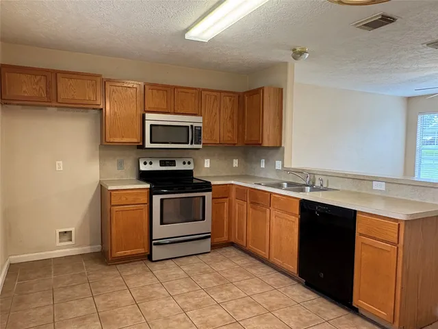 $1,395 | 14129 Broken Arrow Drive, Willis, TX 77378