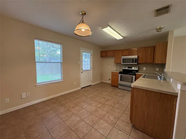 $1,395 | 14129 Broken Arrow Drive, Willis, TX 77378