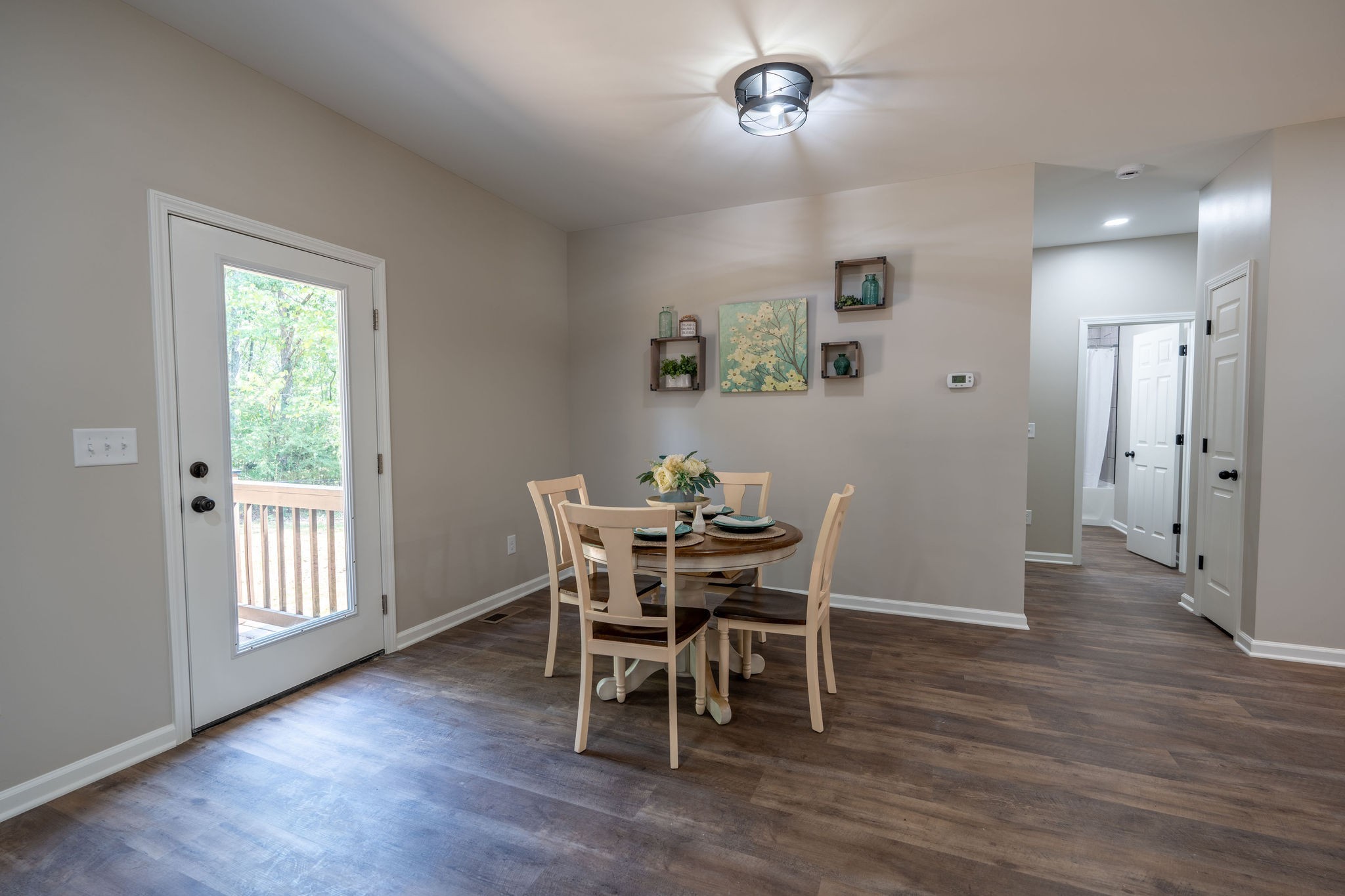 414 Edward Street Waynesboro, TN 38485 - Photo 7 of 17 a view of a dining room with furniture and wooden floor