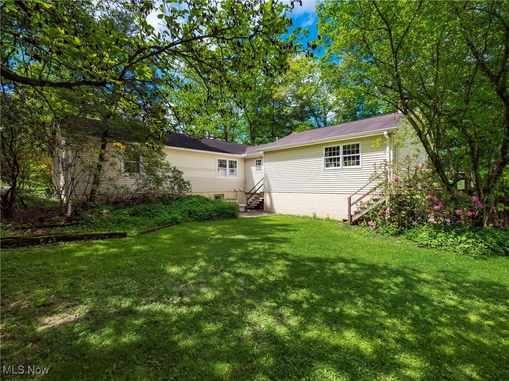 975 Richey Road Zanesville, OH 43701 - Photo 25 of 27 View of grassy yard featuring entry steps