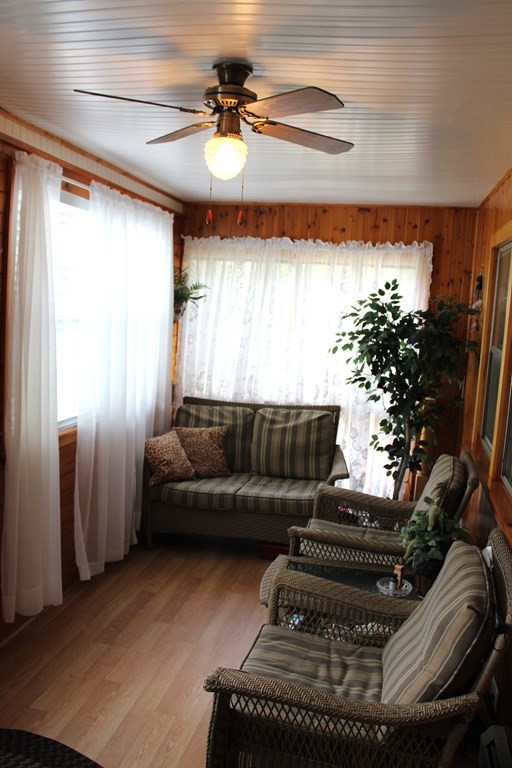 117 Mine Brook Road Webster, MA 01570 - Photo 3 of 21 a living room with furniture and a chandelier