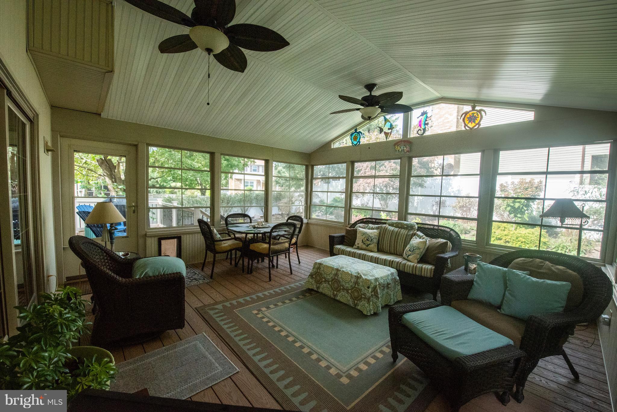3508 Orbitan Road Baltimore, MD 21234 - Photo 1 of 84 Two ceiling fans in Sunroom
