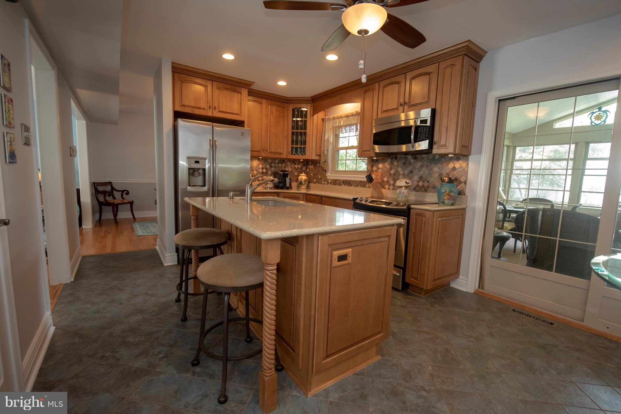 3508 Orbitan Road Baltimore, MD 21234 - Photo 33 of 84 Kitchen with recessed lighting and island