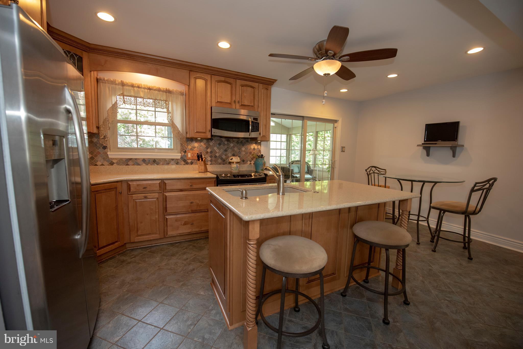 3508 Orbitan Road Baltimore, MD 21234 - Photo 34 of 84 Kitchen with recessed lighting and island