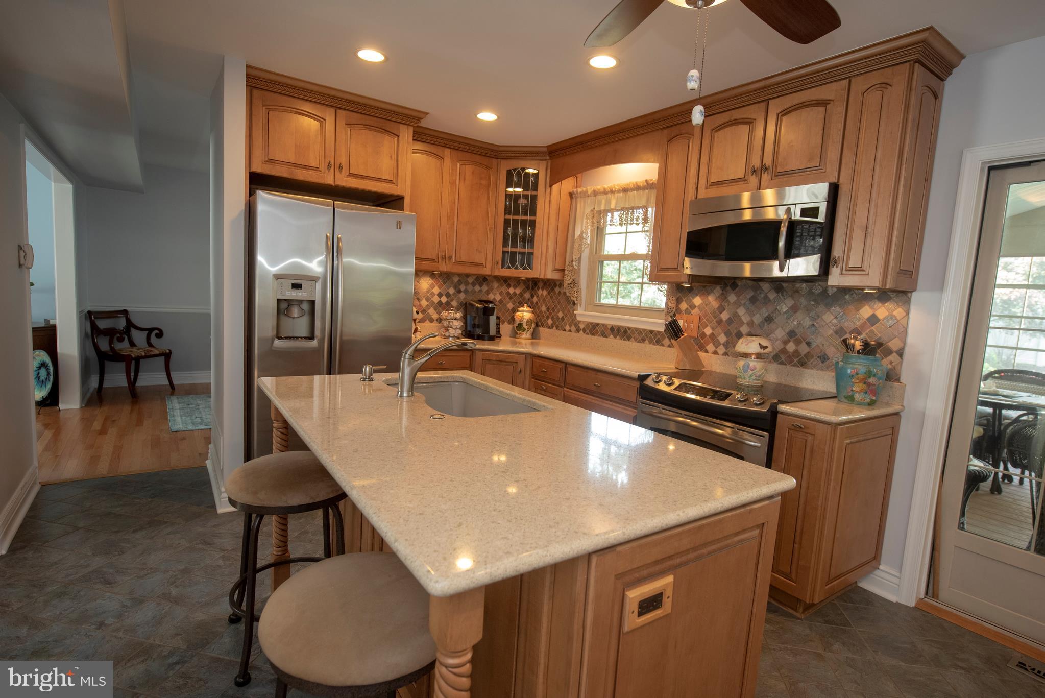 3508 Orbitan Road Baltimore, MD 21234 - Photo 36 of 84 Kitchen with recessed lighting and island