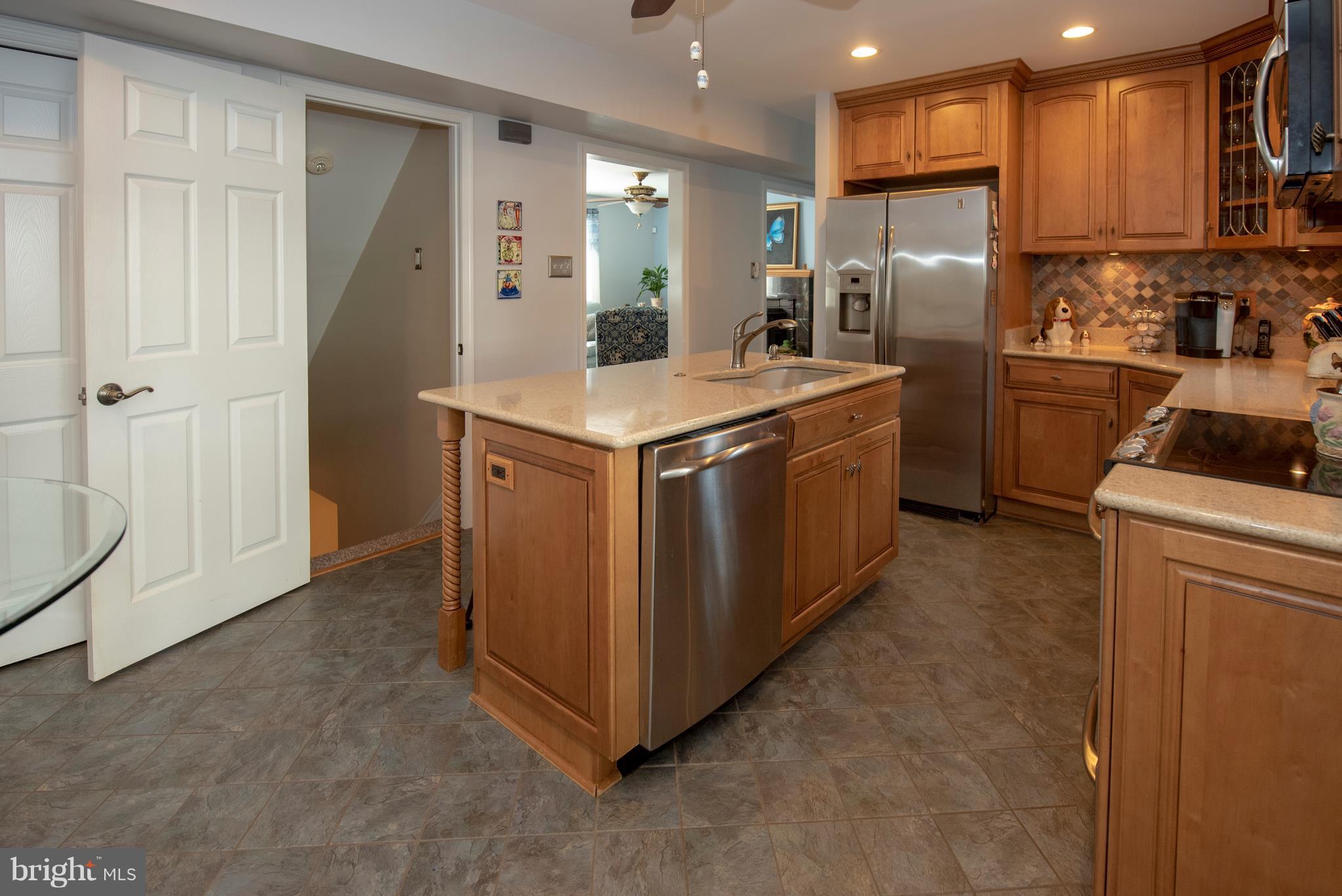 3508 Orbitan Road Baltimore, MD 21234 - Photo 37 of 84 Kitchen with recessed lighting and island