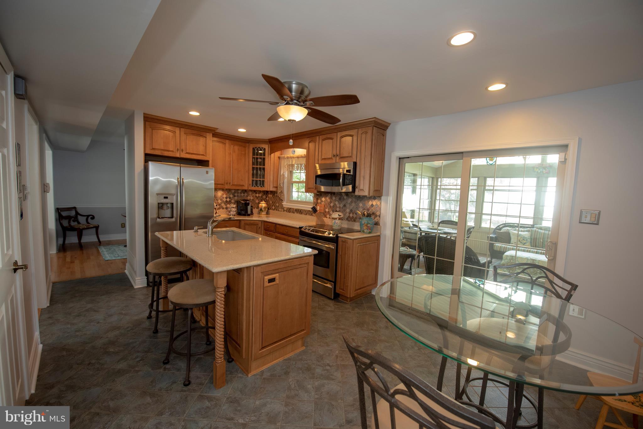 3508 Orbitan Road Baltimore, MD 21234 - Photo 38 of 84 Kitchen with recessed lighting and island