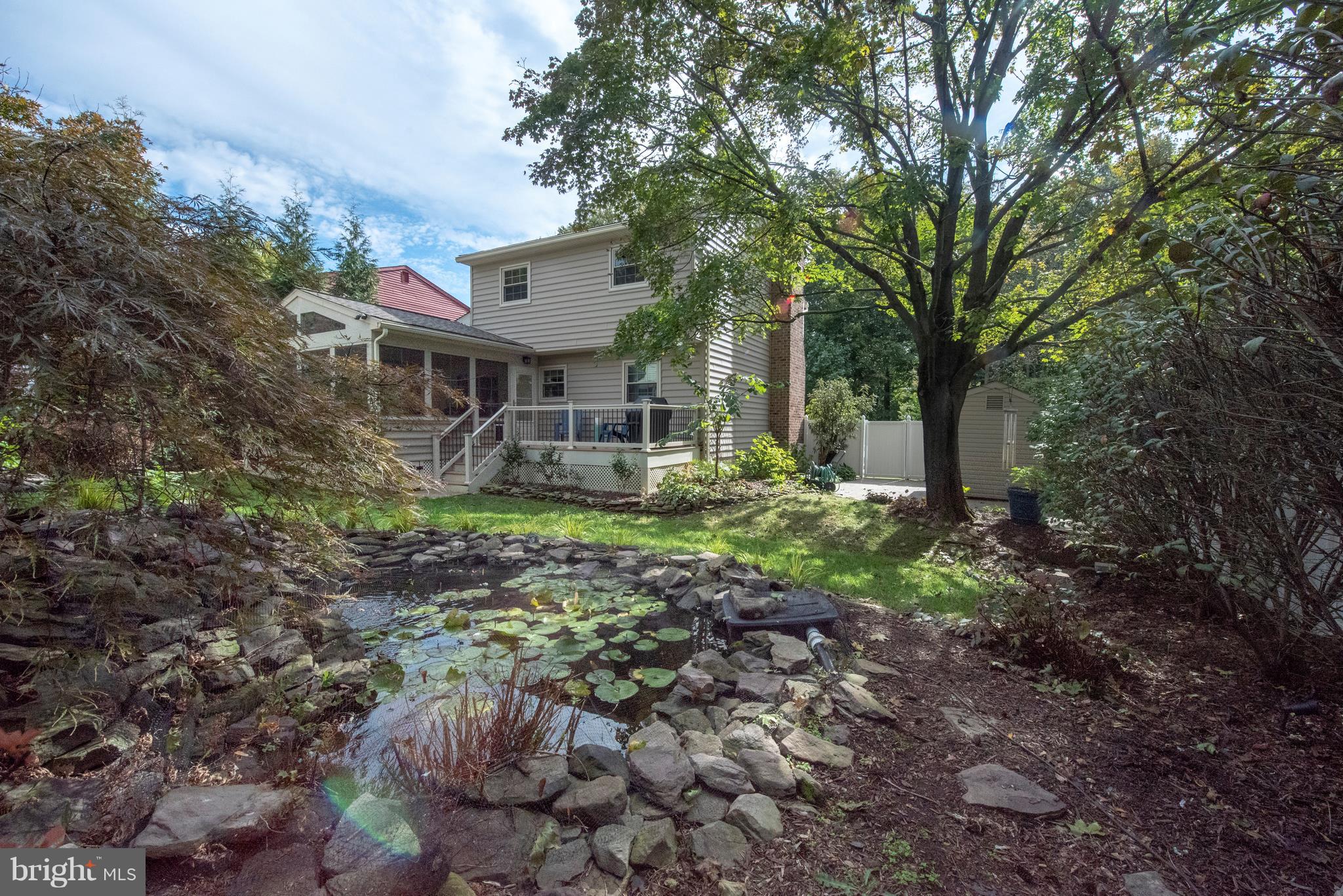 3508 Orbitan Road Baltimore, MD 21234 - Photo 4 of 84 Waterfall pond overlooks backyard