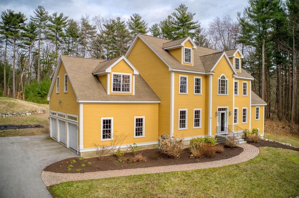 4 Craggs Road Harvard, MA 01451 - Photo 1 of 1 a front view of a house with entertaining space