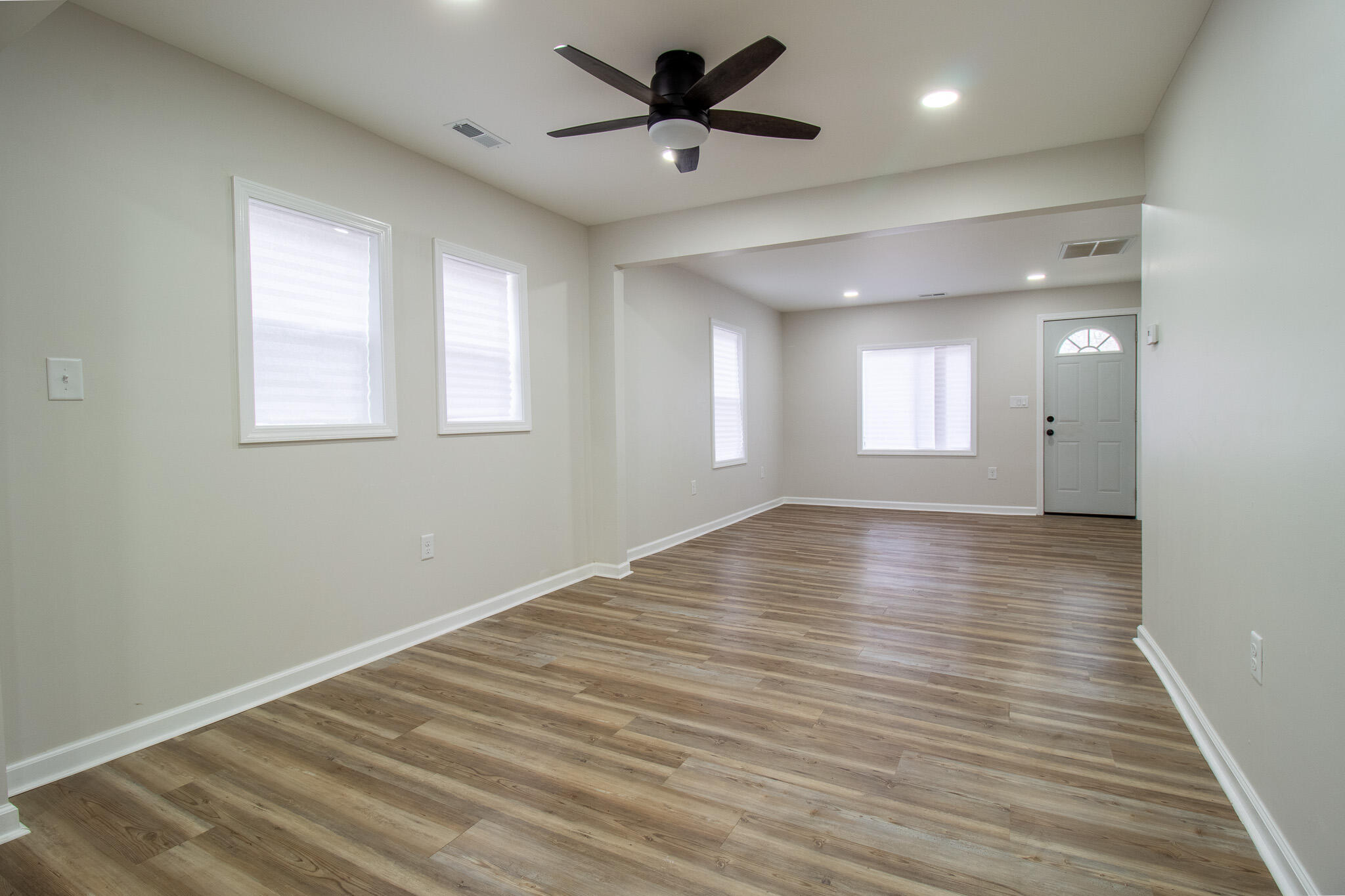 1755 Ralston Street Gary, IN 46406 - Photo 7 of 29 a view of empty room with wooden floor and fan