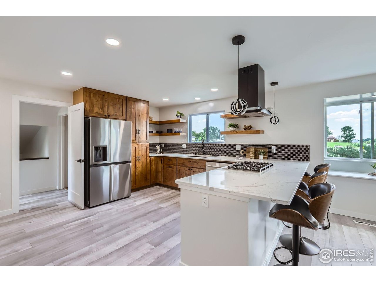 128 Carpenter Road Fort Collins, CO 80525 - Photo 13 of 44 Extra wide counter space.