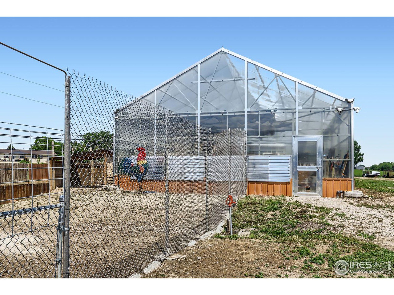 128 Carpenter Road Fort Collins, CO 80525 - Photo 33 of 44 Huge professional nursery/greenhouse with full electric, fans, and garage door access.