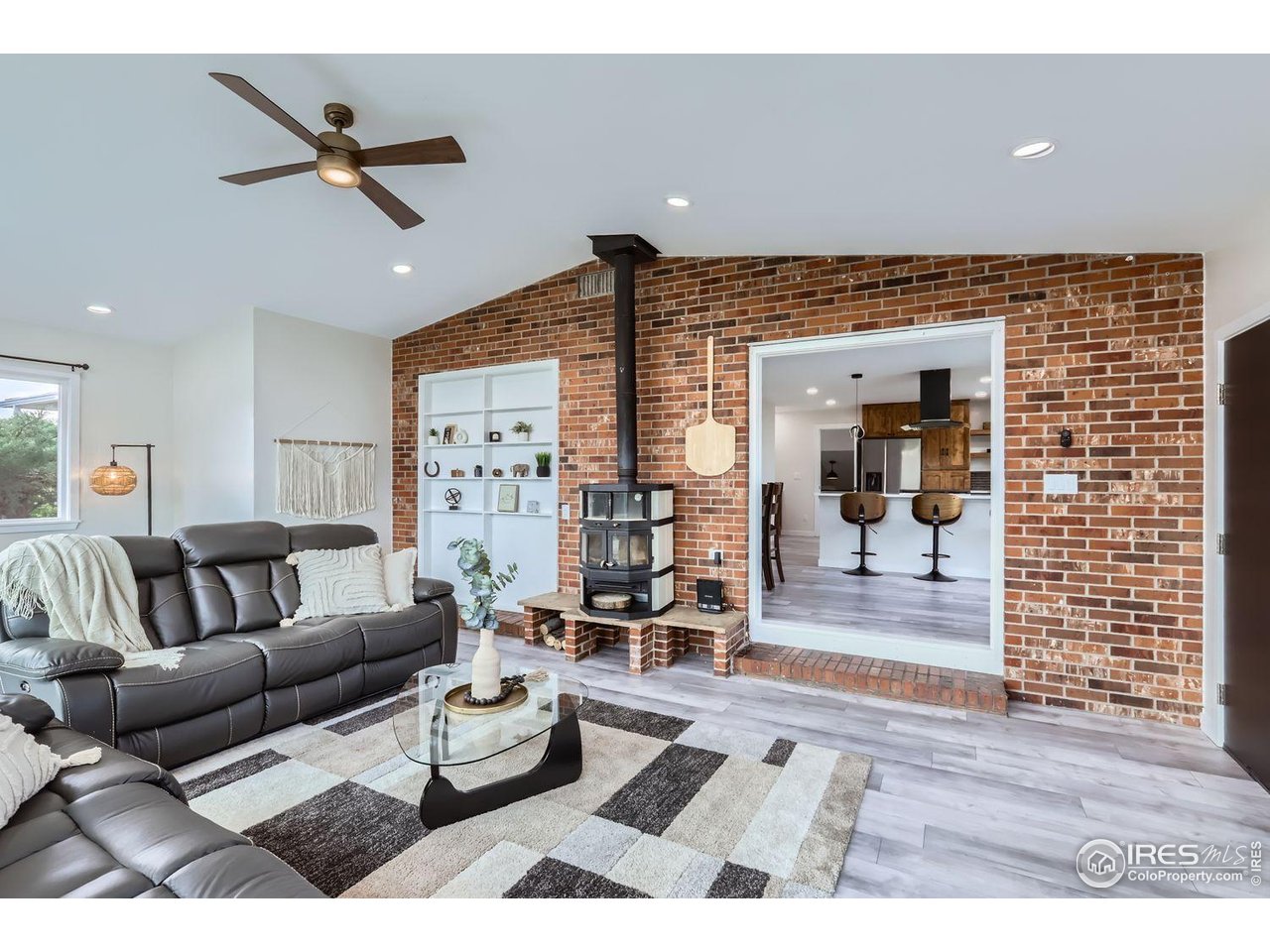 128 Carpenter Road Fort Collins, CO 80525 - Photo 4 of 44 Wood burning stove for ambiance or making pizza for guests!