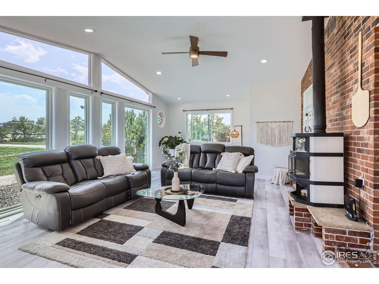 128 Carpenter Road Fort Collins, CO 80525 - Photo 5 of 44 Updated floor to ceiling windows.
