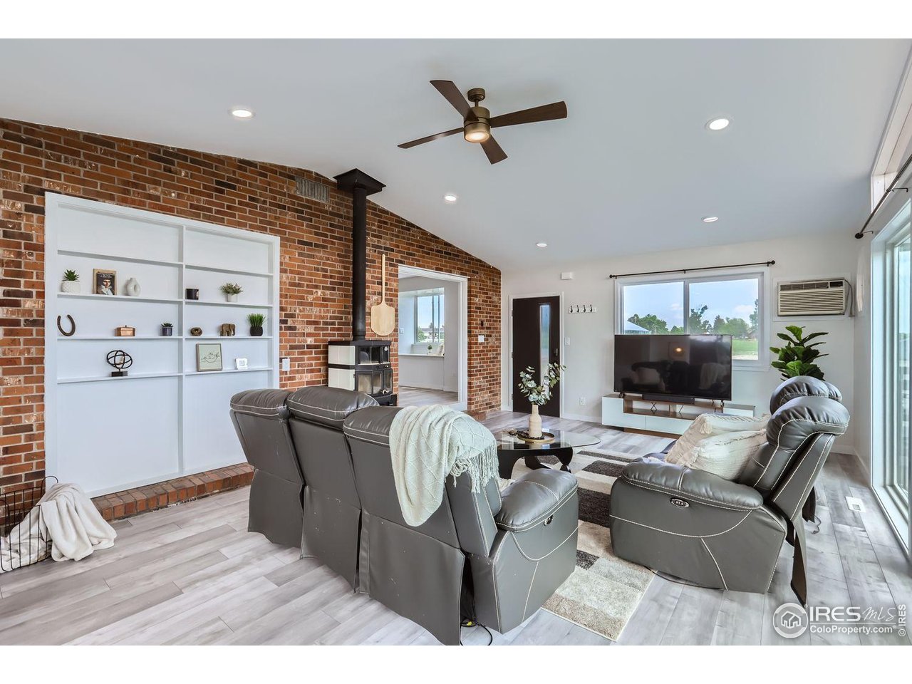 128 Carpenter Road Fort Collins, CO 80525 - Photo 6 of 44 Airy vaulted ceilings and charming built-ins.