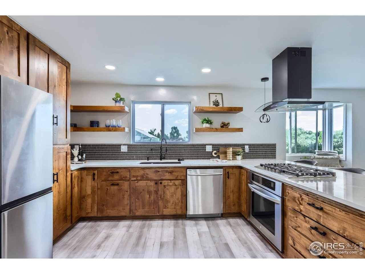 128 Carpenter Road Fort Collins, CO 80525 - Photo 8 of 44 Updated SS appliances and lots of cabinet space!