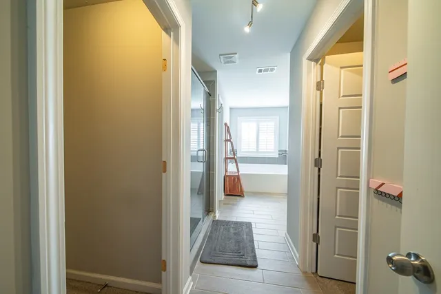 a view of a room with racks on the wall