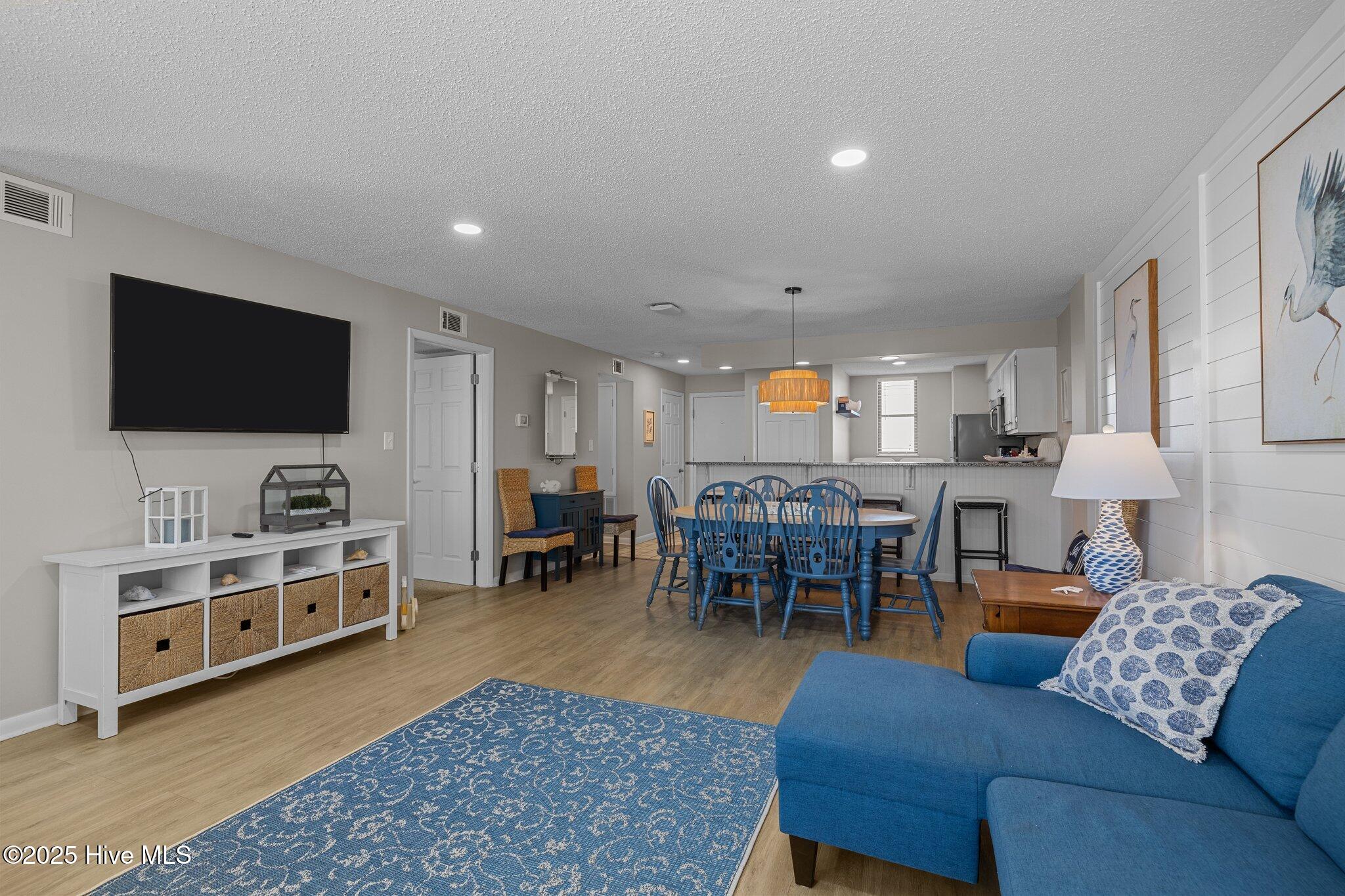 1505 Salter Path Road, Unit 409 Indian Beach, NC 28512 - Photo 5 of 35 Living, Dining, Kitchen Space