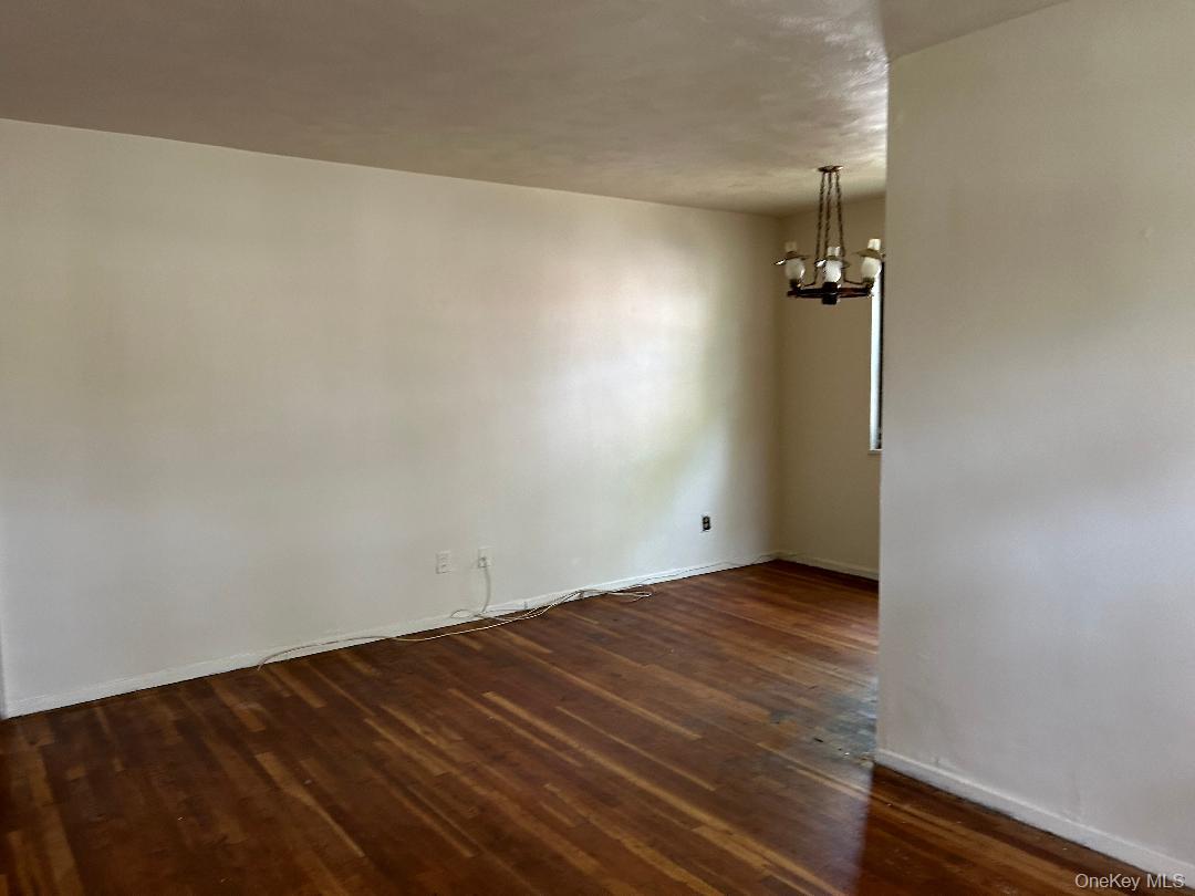 163-30 17th Avenue, Unit 4297 Queens, NY 11357 - Photo 16 of 17 wooden floor in a room