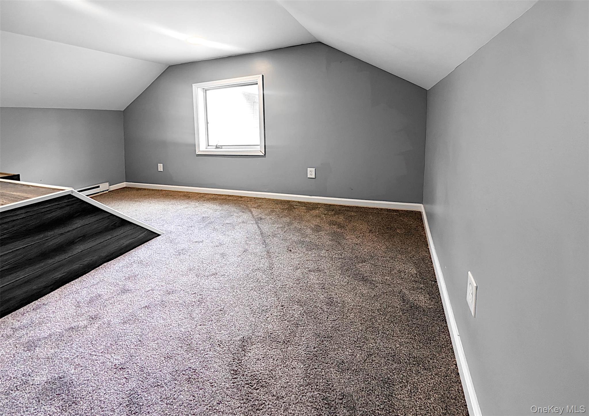 784 County Rte 12 New Hampton, NY 10958 - Photo 13 of 19 an empty room with a empty space and window