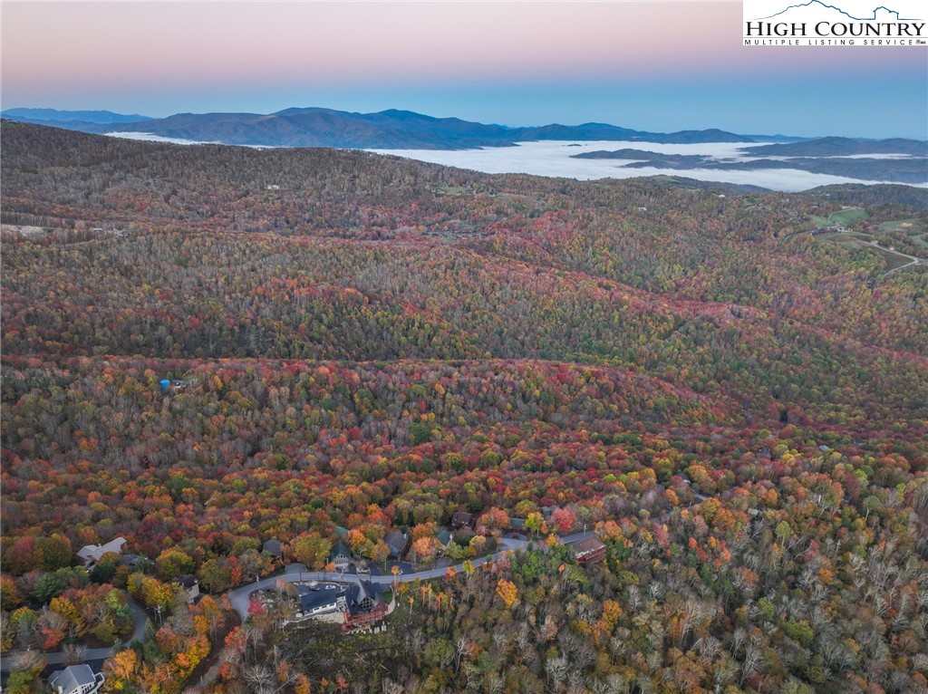 309 Pinnacle Ridge Road Beech Mountain, NC 28604 - Photo 30 of 45 a view of an ocean beach and mountain