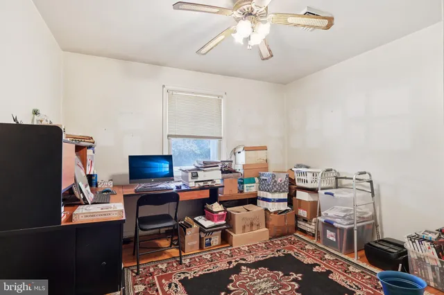 a room with furniture and gym equipment