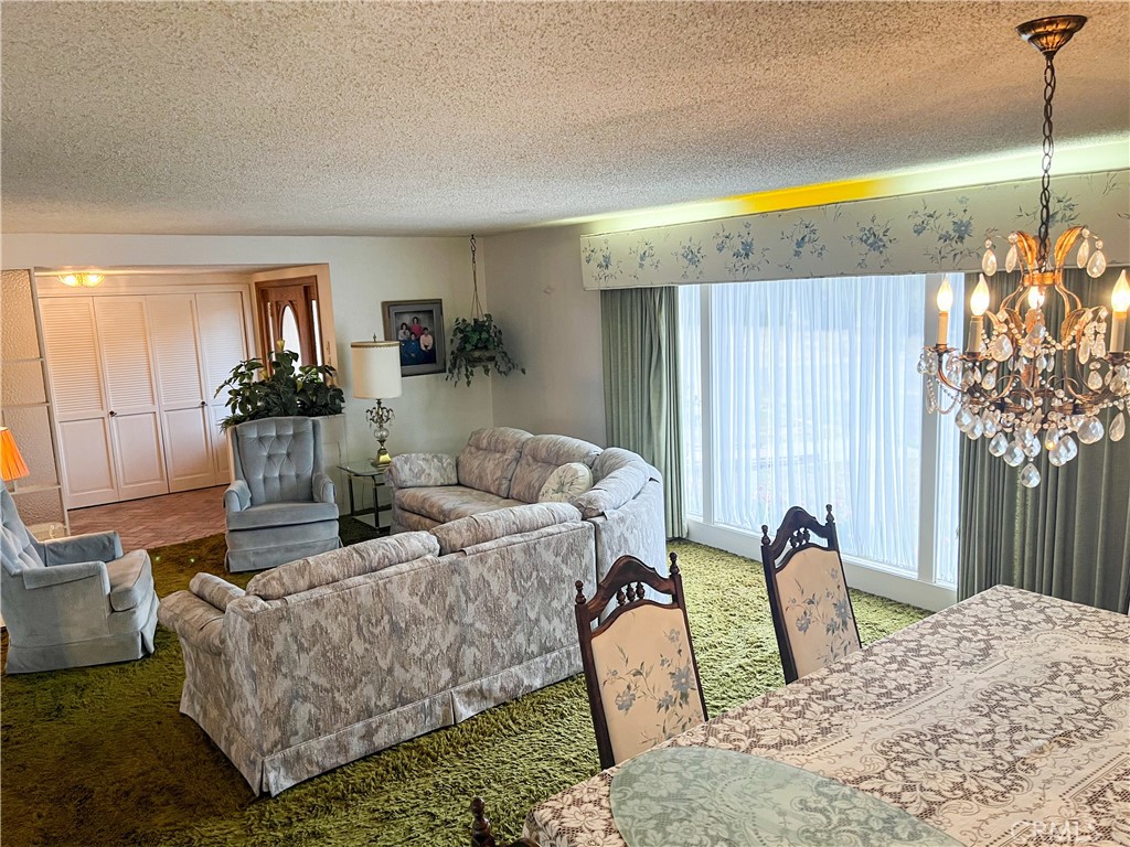 3665 Woodson Avenue Corning, CA 96021 - Photo 6 of 30 a living room with furniture and a large window