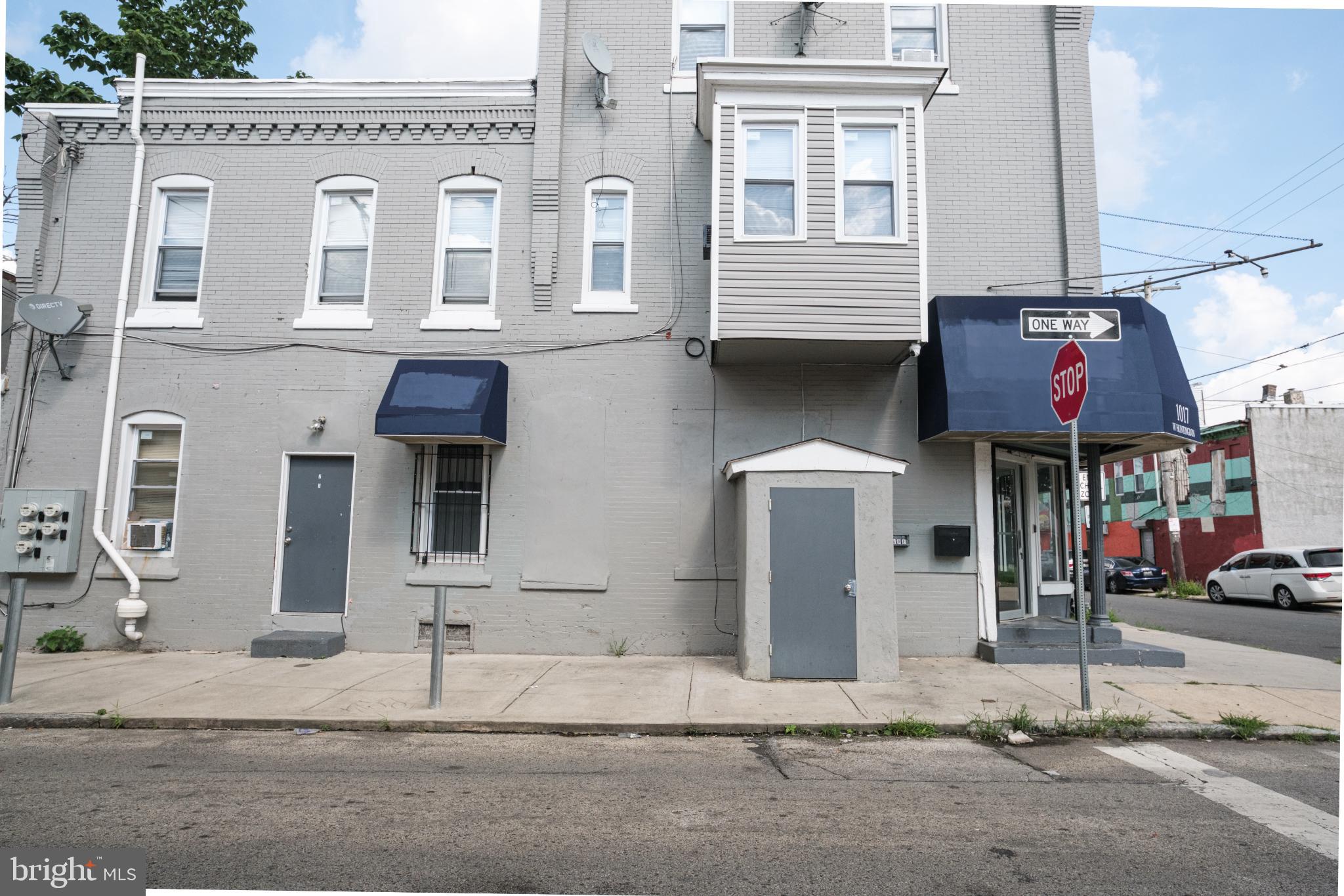1017 West Huntingdon Street, Unit 3 Philadelphia, PA 19133 - Photo 7 of 8 a front view of a building with street