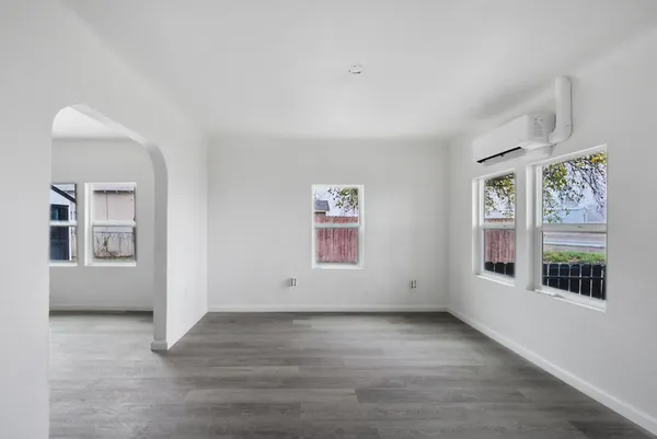 an empty room with windows