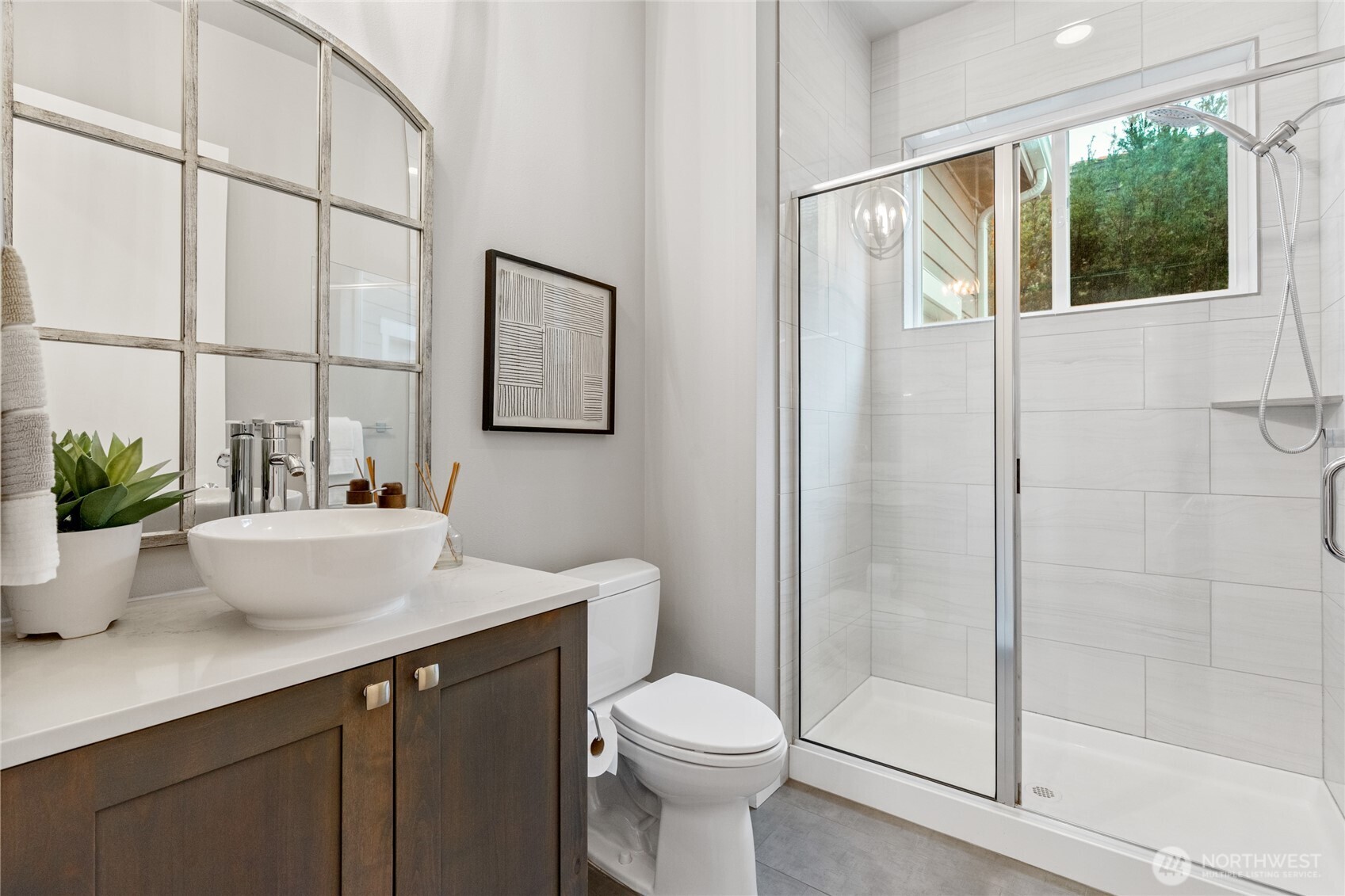 3303 Northeast 7th Street Renton, WA 98056 - Photo 12 of 25 a bathroom with a sink a toilet and shower