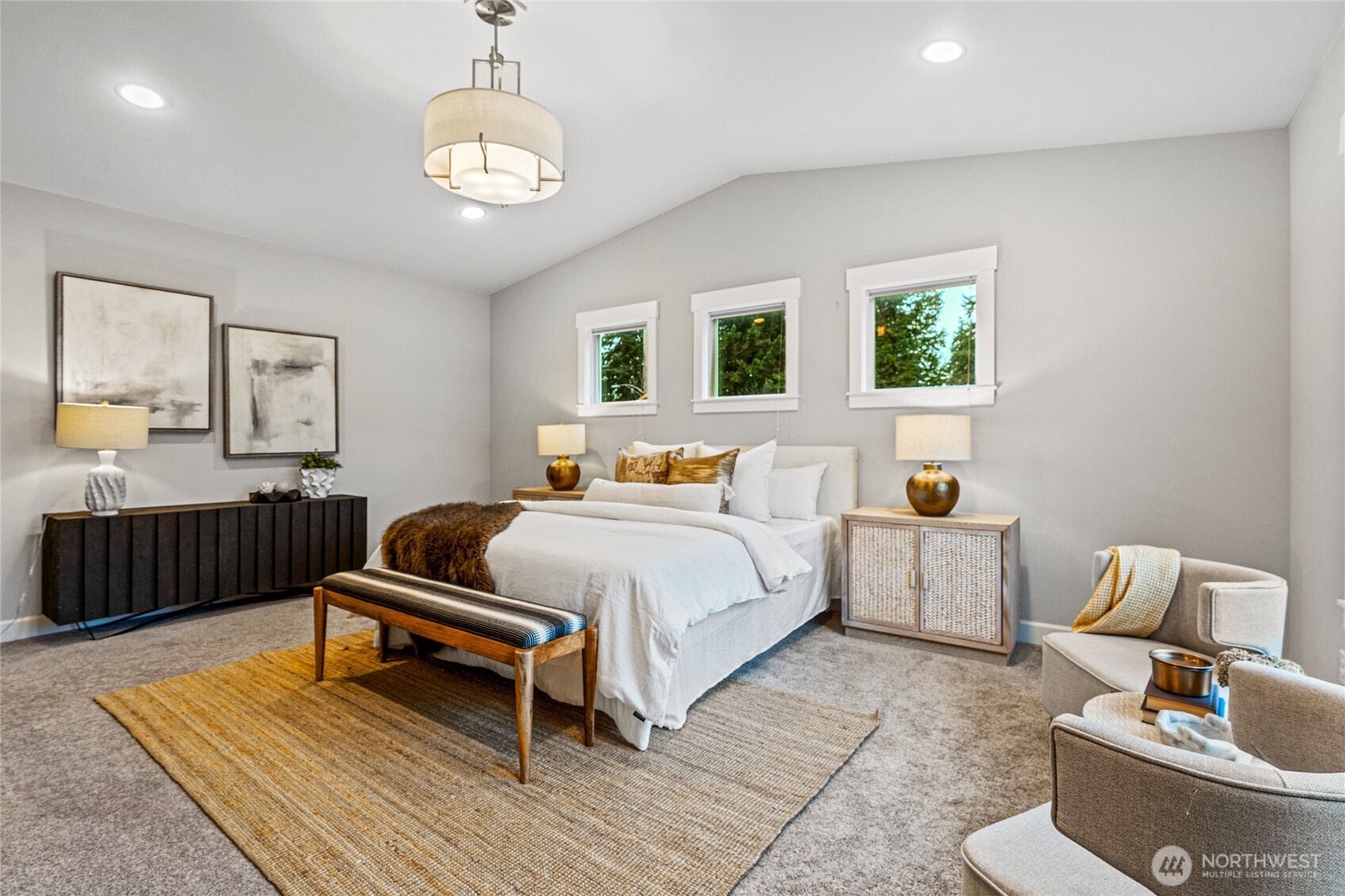 3303 Northeast 7th Street Renton, WA 98056 - Photo 13 of 25 a bedroom with furniture and a wooden floor