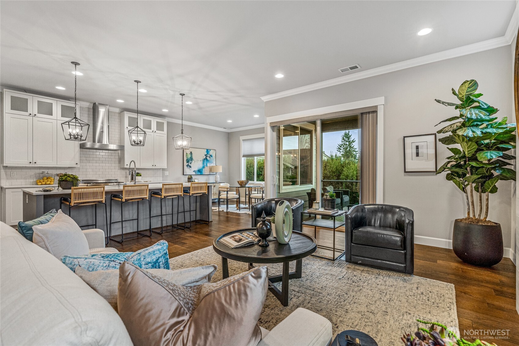 3303 Northeast 7th Street Renton, WA 98056 - Photo 4 of 25 a living room with furniture kitchen view and a large window
