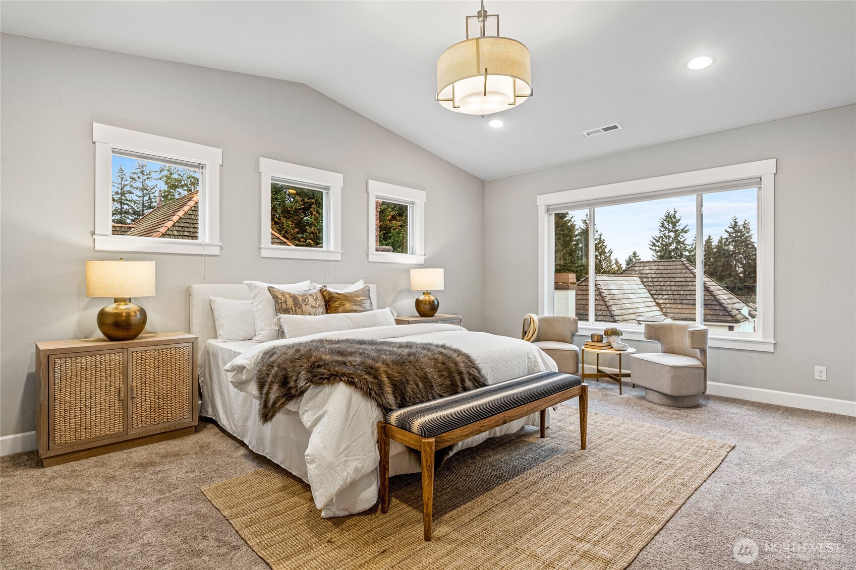 3303 Northeast 7th Street Renton, WA 98056 - Photo 8 of 25 a spacious bedroom with a bed and glass window