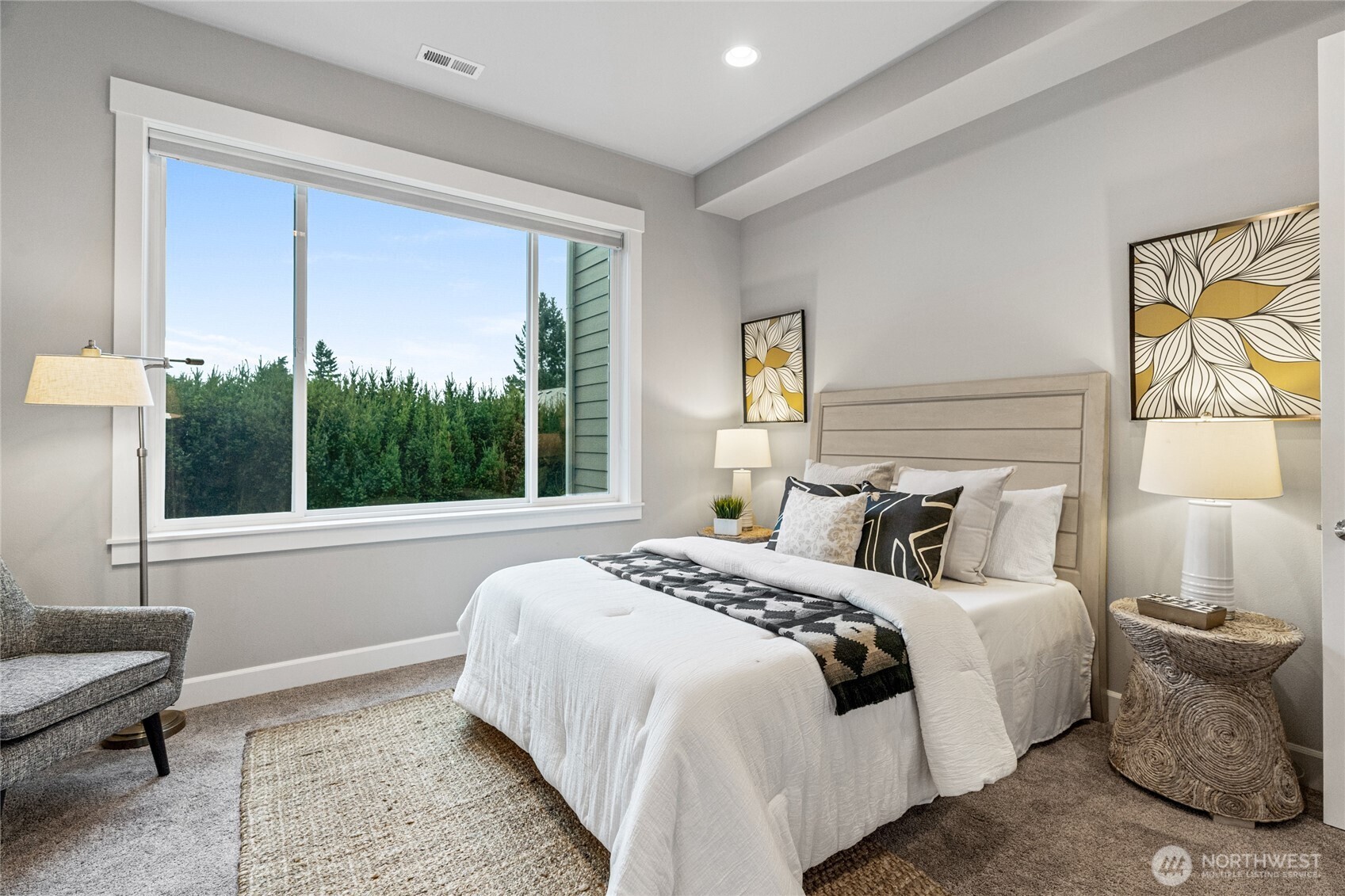 3303 Northeast 7th Street Renton, WA 98056 - Photo 9 of 25 a bedroom with a bed and a window