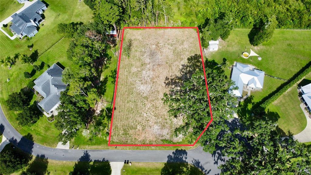 Tbd Southwest 9th Street Williston, FL 32696 - Photo 3 of 9 an aerial view of a residential houses with yard and swimming pool