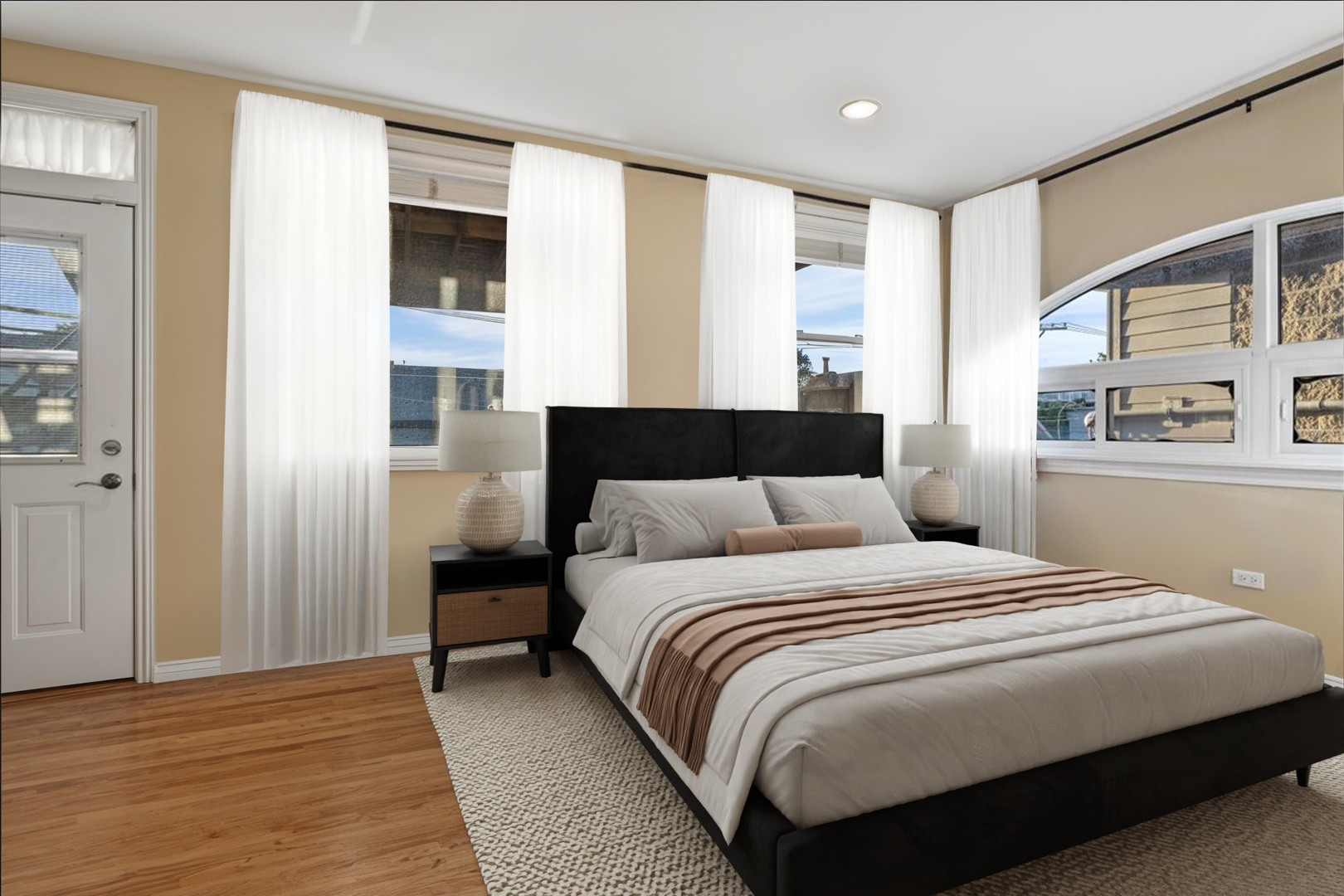 2642 North Racine Avenue, Unit 2N Chicago, IL 60614 - Photo 11 of 22 a bedroom with a large bed and a window