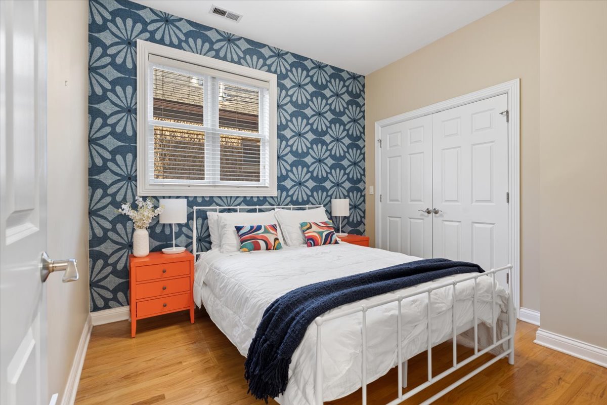 2642 North Racine Avenue, Unit 2N Chicago, IL 60614 - Photo 15 of 22 a bedroom with a bed and window