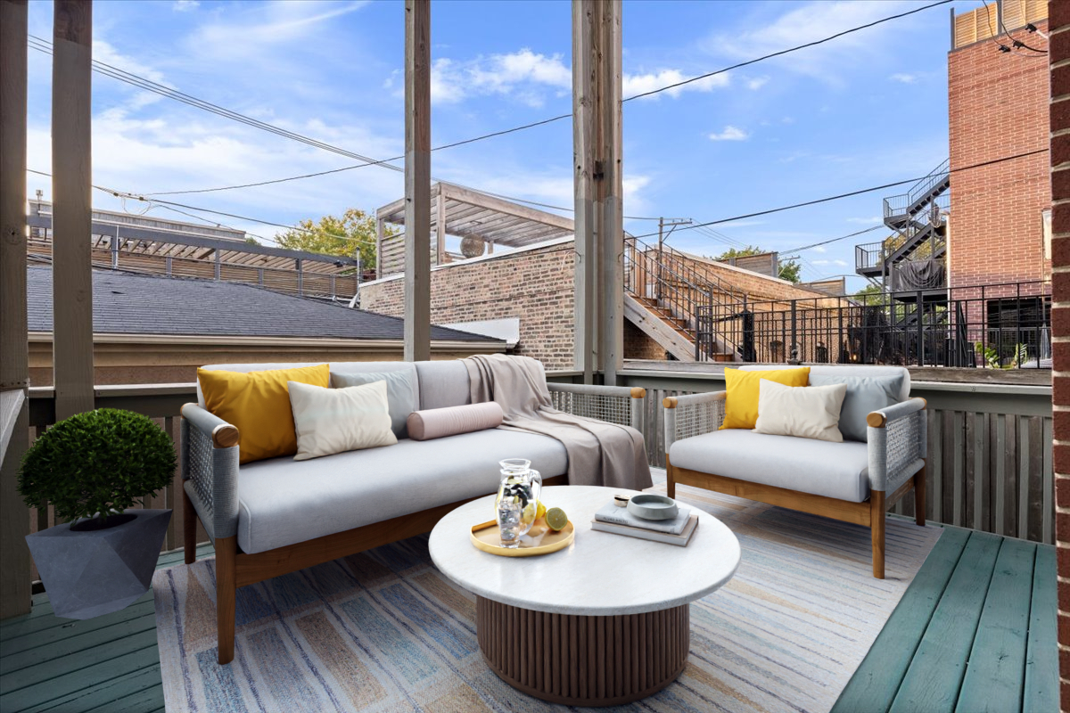 2642 North Racine Avenue, Unit 2N Chicago, IL 60614 - Photo 20 of 22 a balcony with furniture and a potted plant