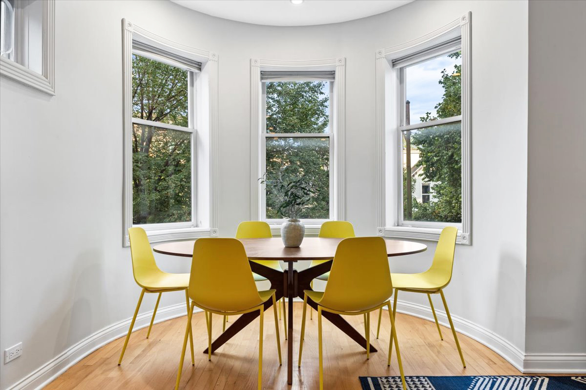 2642 North Racine Avenue, Unit 2N Chicago, IL 60614 - Photo 5 of 22 a view of a dining room with tables and chairs