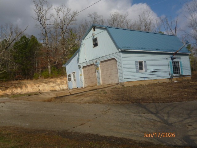 14765 Highway 70 East Huntingdon, TN 38344 - Photo 3 of 11 a front view of a house with a yard